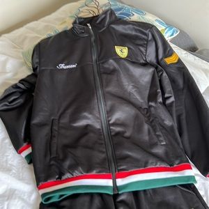 Black athletic suit. Never worn. New